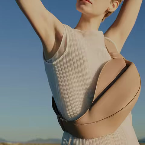 2025 New Fashionable Horn Bag large capacity pillow shaped personalized niche travel smooth cowhide crossbody bag